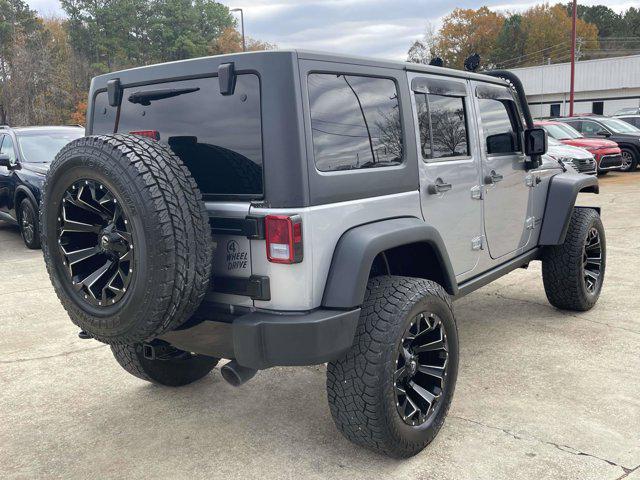 used 2015 Jeep Wrangler Unlimited car, priced at $17,111
