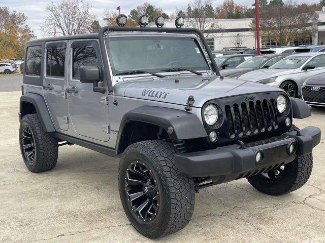 used 2015 Jeep Wrangler Unlimited car, priced at $17,111