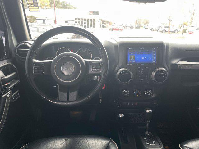 used 2015 Jeep Wrangler Unlimited car, priced at $17,111