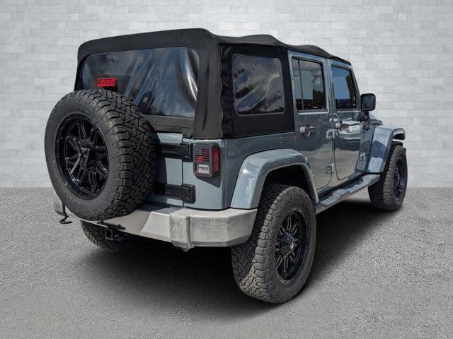 used 2014 Jeep Wrangler Unlimited car, priced at $16,791