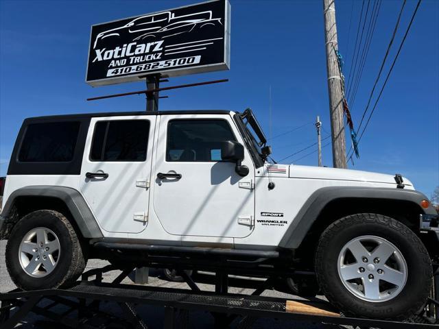 used 2012 Jeep Wrangler Unlimited car, priced at $17,499