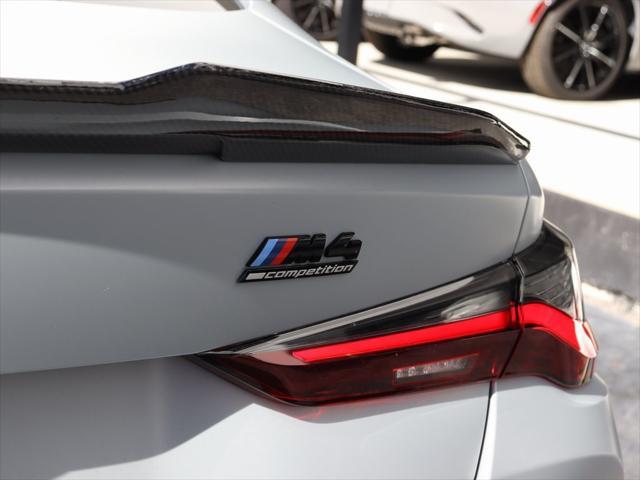 used 2024 BMW M4 car, priced at $89,990