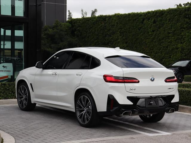 used 2022 BMW X4 car, priced at $43,890