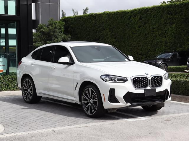 used 2022 BMW X4 car, priced at $43,890