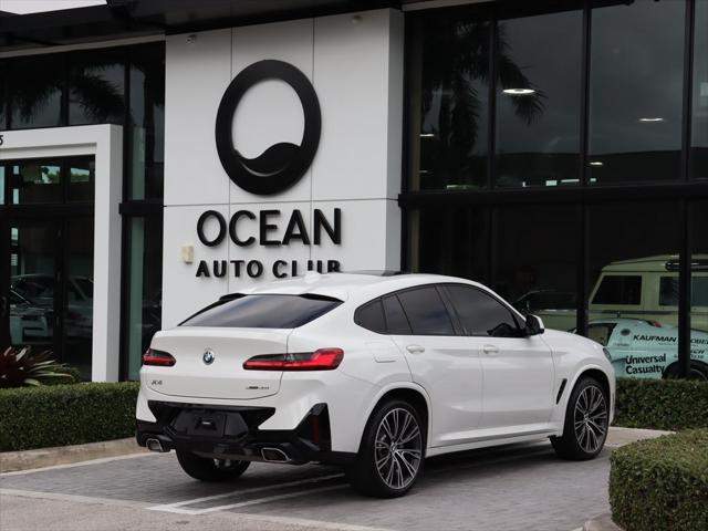 used 2022 BMW X4 car, priced at $43,890