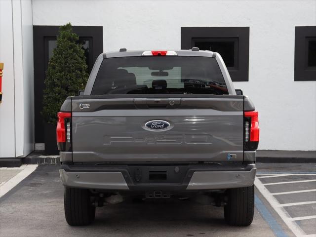 used 2023 Ford F-150 Lightning car, priced at $43,990