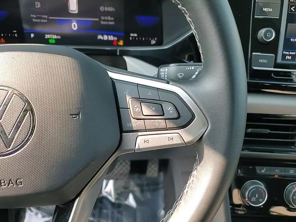 used 2023 Volkswagen Taos car, priced at $20,300
