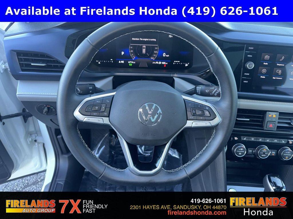 used 2024 Volkswagen Taos car, priced at $24,500