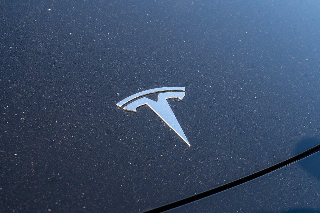 used 2024 Tesla Model Y car, priced at $30,638