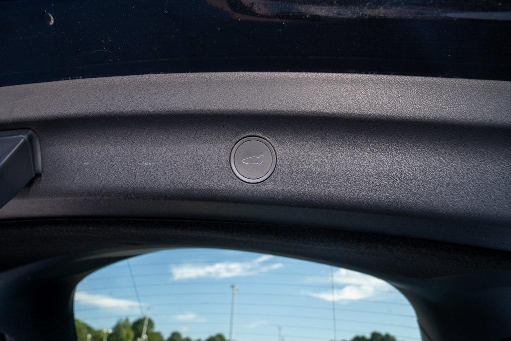 used 2024 Tesla Model Y car, priced at $30,638