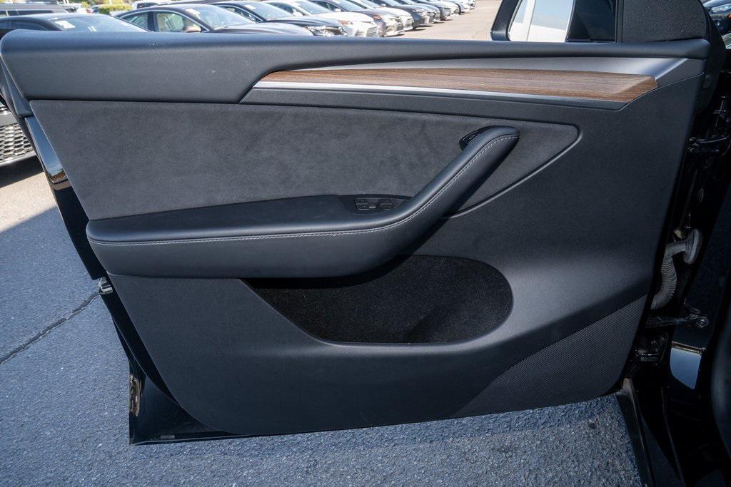 used 2024 Tesla Model Y car, priced at $30,638