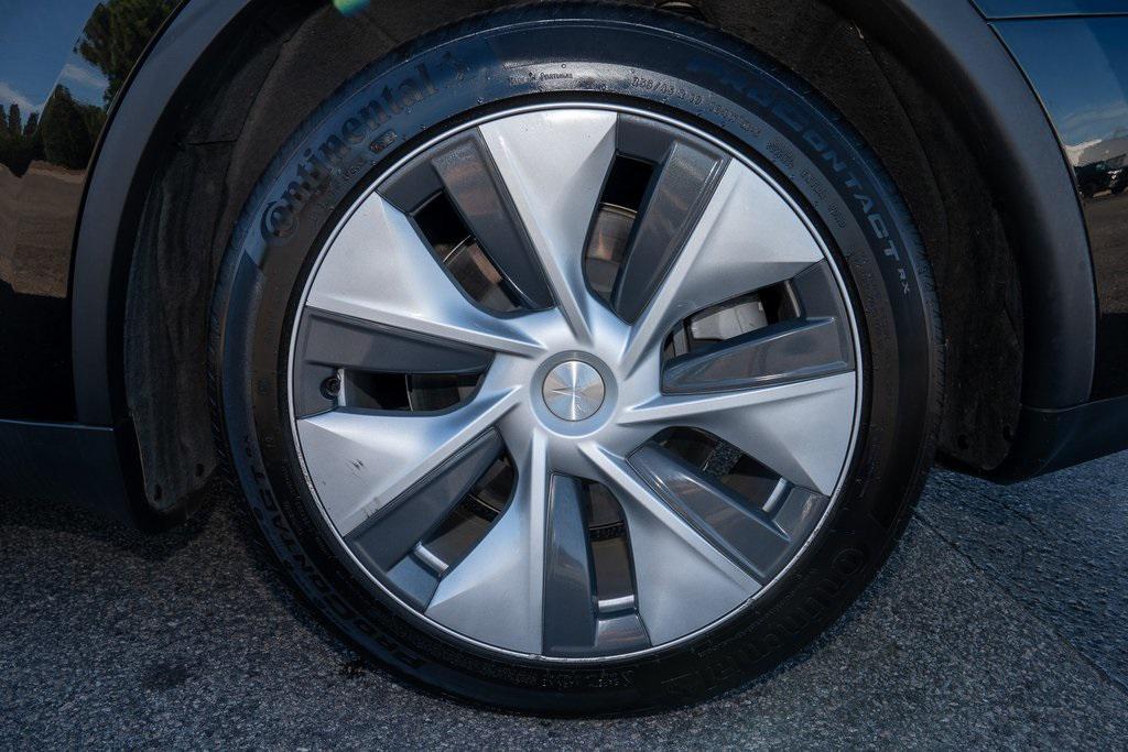 used 2024 Tesla Model Y car, priced at $30,638
