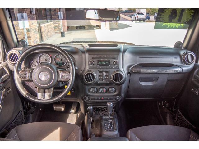 used 2014 Jeep Wrangler Unlimited car, priced at $23,874