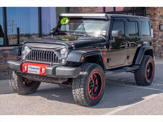 used 2014 Jeep Wrangler Unlimited car, priced at $23,874