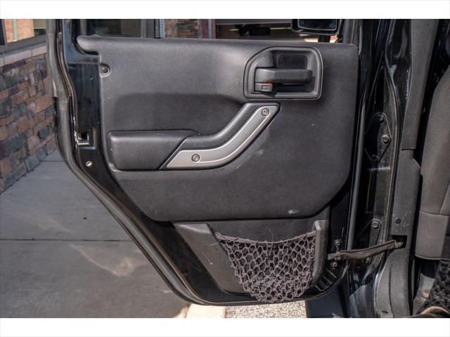 used 2014 Jeep Wrangler Unlimited car, priced at $23,874