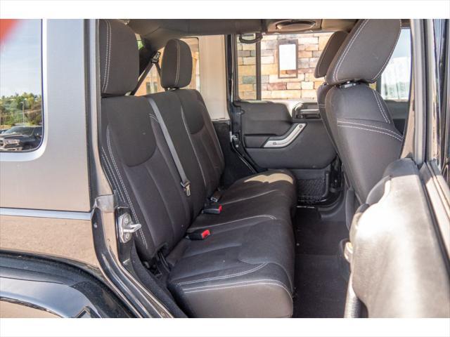 used 2014 Jeep Wrangler Unlimited car, priced at $23,874