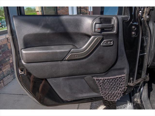 used 2014 Jeep Wrangler Unlimited car, priced at $23,874