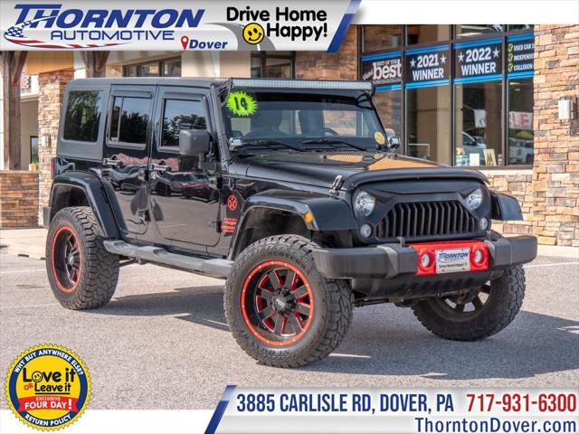 used 2014 Jeep Wrangler Unlimited car, priced at $23,874