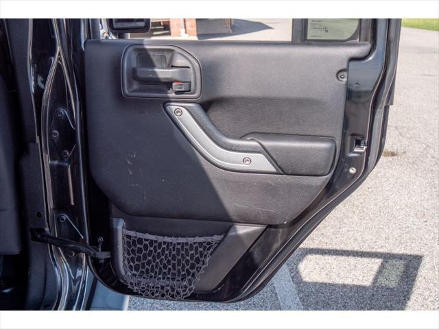 used 2014 Jeep Wrangler Unlimited car, priced at $23,874