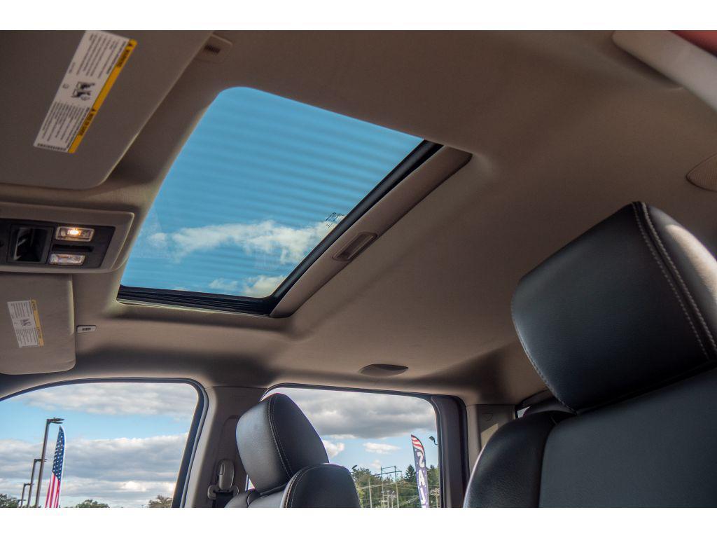 used 2018 Ram 1500 car, priced at $32,754