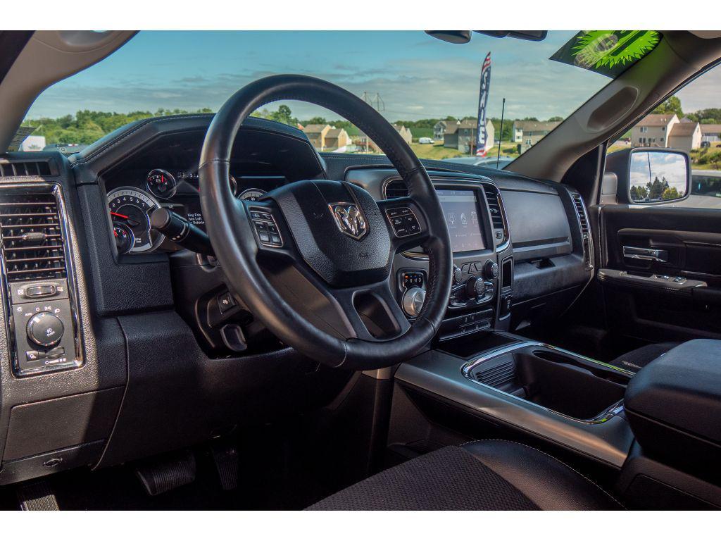 used 2018 Ram 1500 car, priced at $28,956