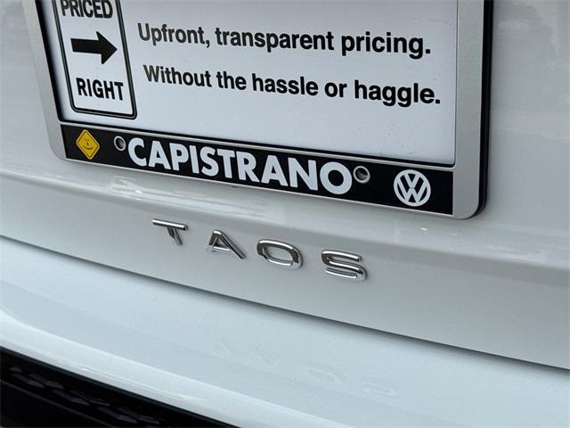 used 2025 Volkswagen Taos car, priced at $23,716