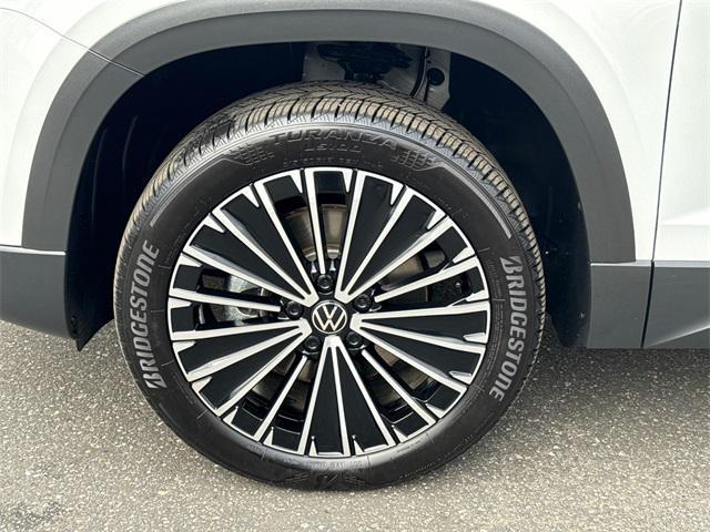 used 2025 Volkswagen Taos car, priced at $26,616