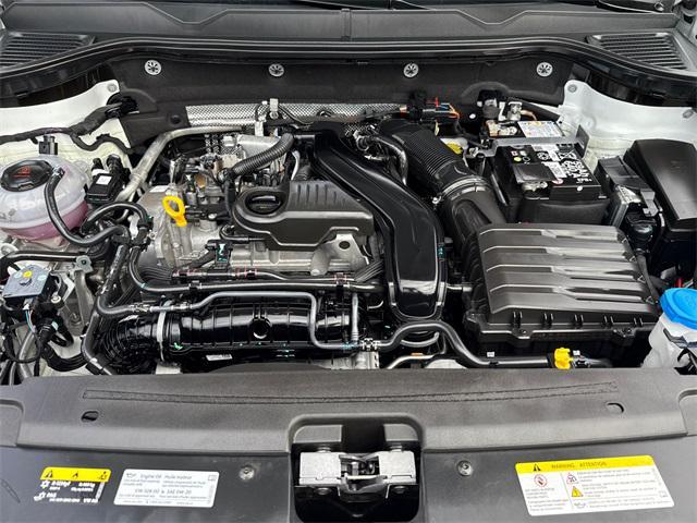 used 2025 Volkswagen Taos car, priced at $26,616