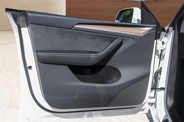 used 2025 Tesla Model Y car, priced at $39,791