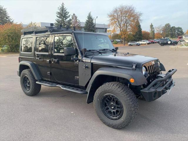 used 2018 Jeep Wrangler JK Unlimited car, priced at $19,273