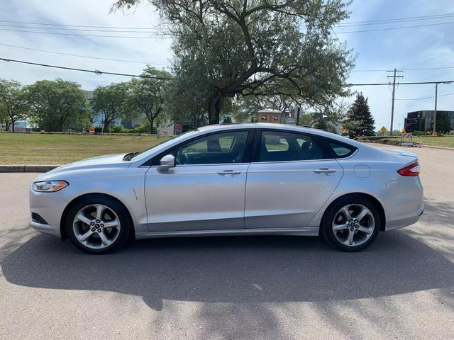 used 2016 Ford Fusion car, priced at $10,058