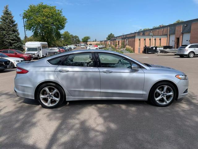 used 2016 Ford Fusion car, priced at $10,058