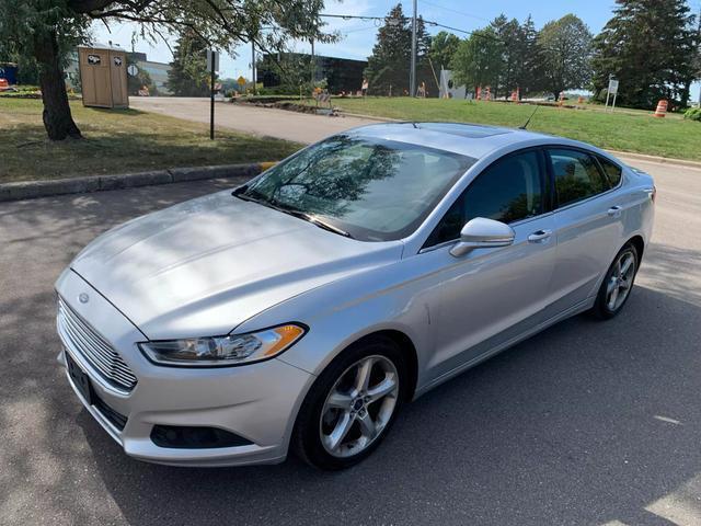 used 2016 Ford Fusion car, priced at $10,058