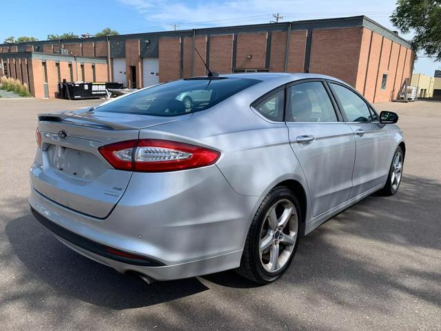 used 2016 Ford Fusion car, priced at $10,058