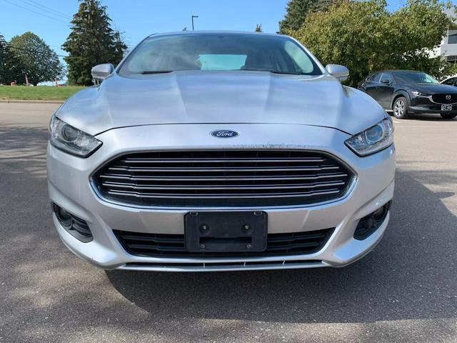 used 2016 Ford Fusion car, priced at $10,058