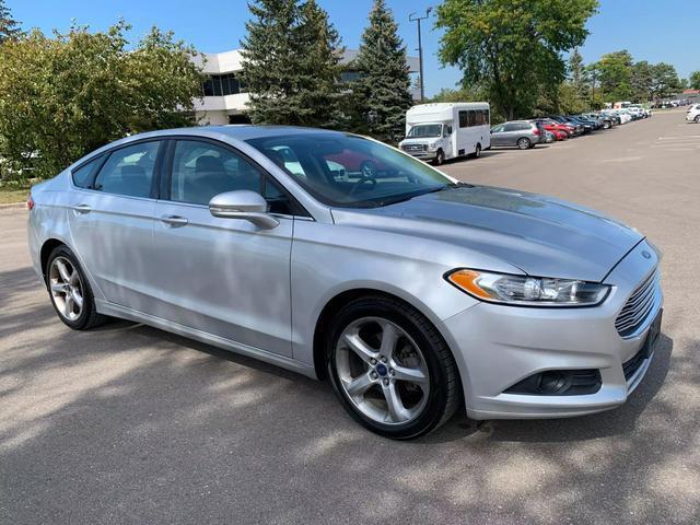 used 2016 Ford Fusion car, priced at $10,058