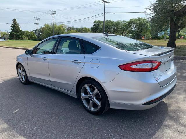 used 2016 Ford Fusion car, priced at $10,058