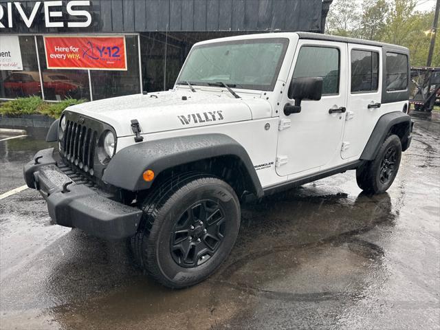 used 2015 Jeep Wrangler Unlimited car, priced at $15,900