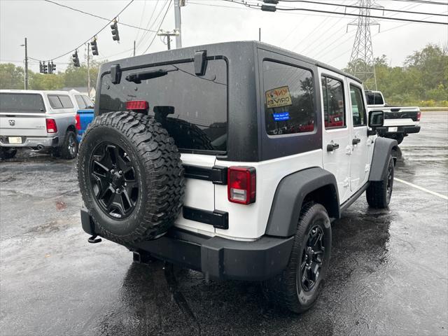 used 2015 Jeep Wrangler Unlimited car, priced at $15,900