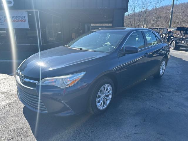 used 2015 Toyota Camry car, priced at $12,900