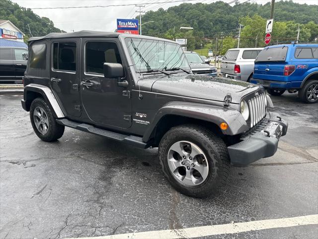 used 2016 Jeep Wrangler Unlimited car, priced at $18,900