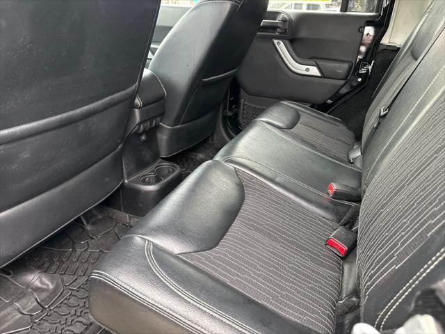 used 2013 Jeep Wrangler Unlimited car, priced at $15,900