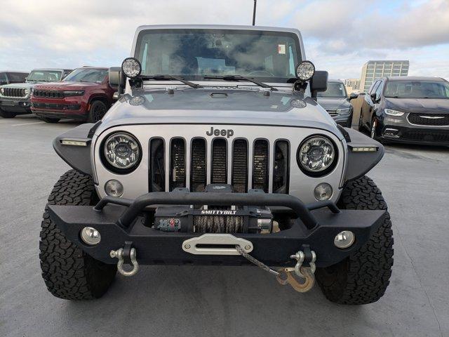 used 2015 Jeep Wrangler Unlimited car, priced at $15,288