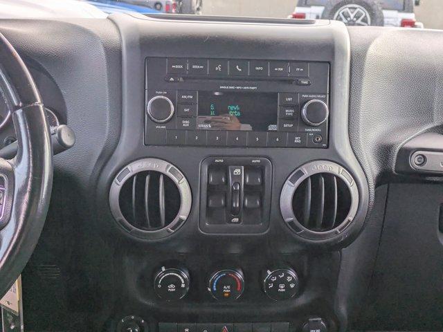 used 2015 Jeep Wrangler Unlimited car, priced at $15,288