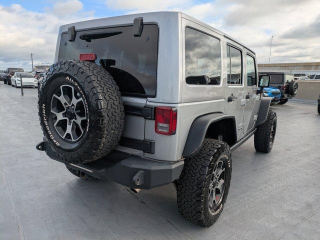 used 2015 Jeep Wrangler Unlimited car, priced at $15,288