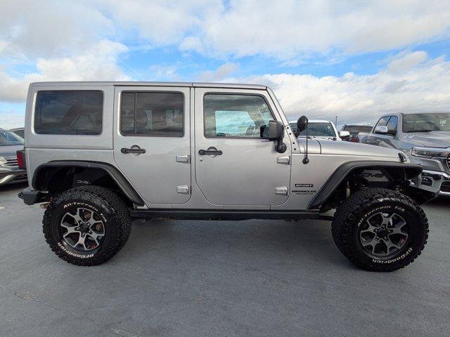 used 2015 Jeep Wrangler Unlimited car, priced at $15,288