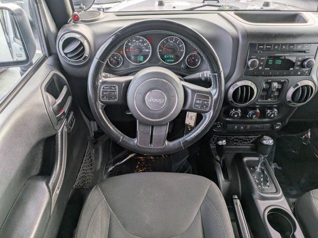 used 2015 Jeep Wrangler Unlimited car, priced at $15,288
