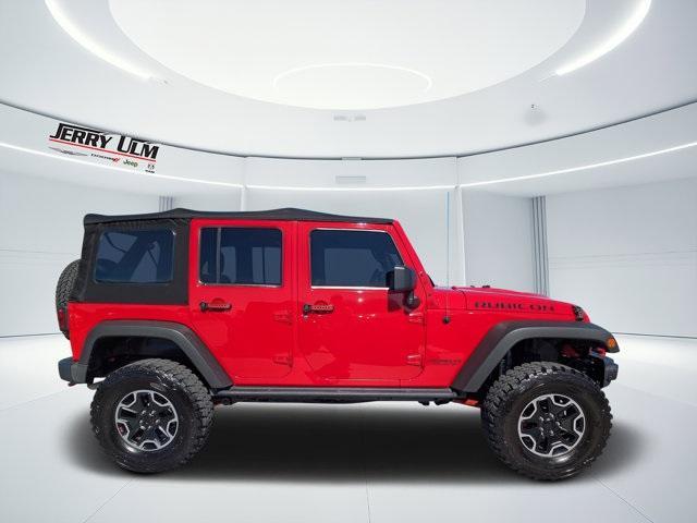 used 2015 Jeep Wrangler Unlimited car, priced at $14,066