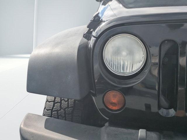 used 2013 Jeep Wrangler Unlimited car, priced at $10,988