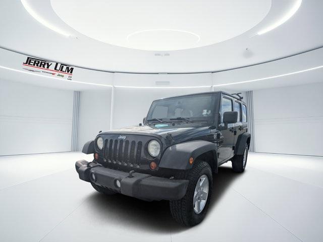 used 2013 Jeep Wrangler Unlimited car, priced at $10,988